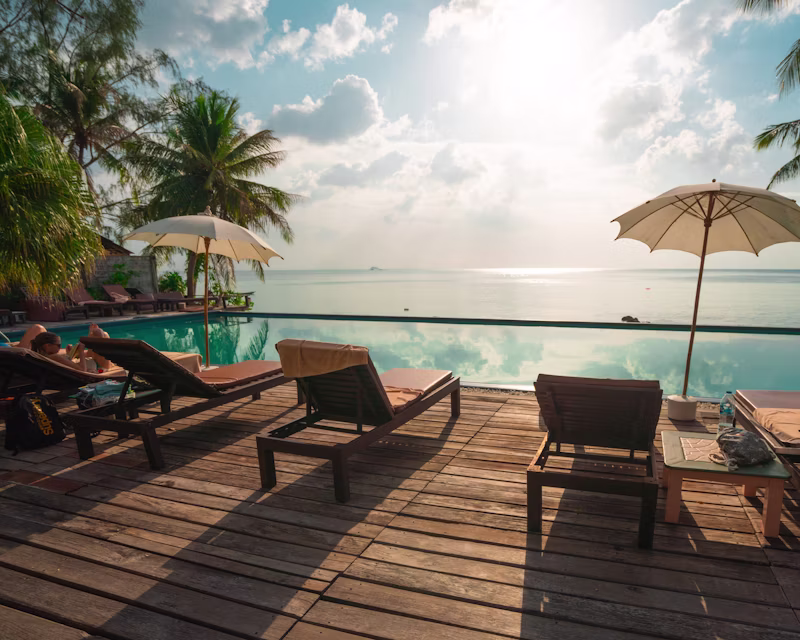 Resort pool with sun loungers